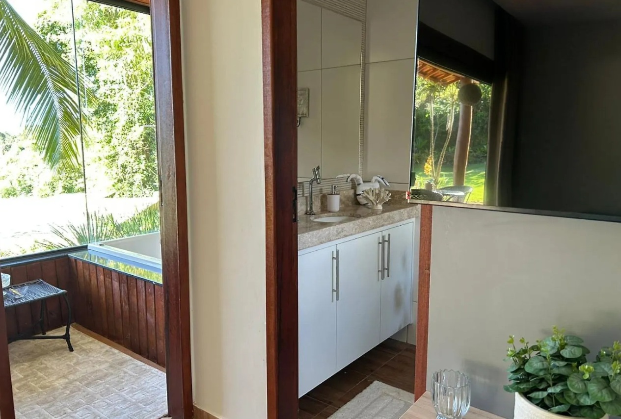 Bathroom with forest window